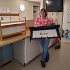 Pauline posing with a home decor item 