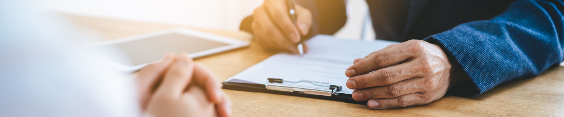 Person looking over paperwork