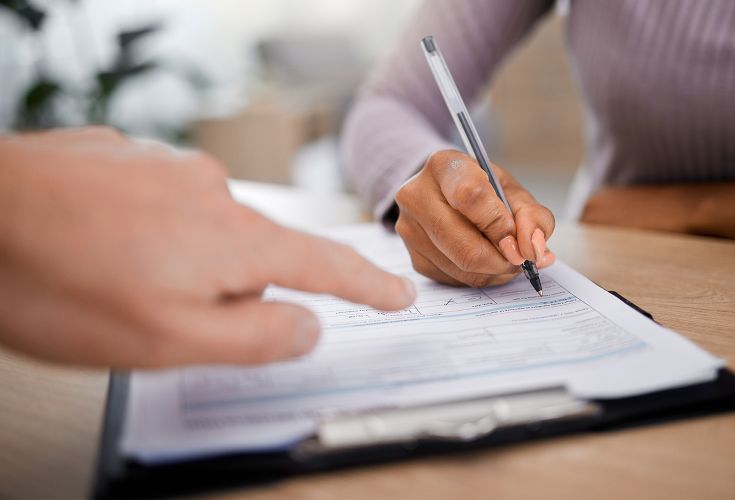 Woman filling out a form