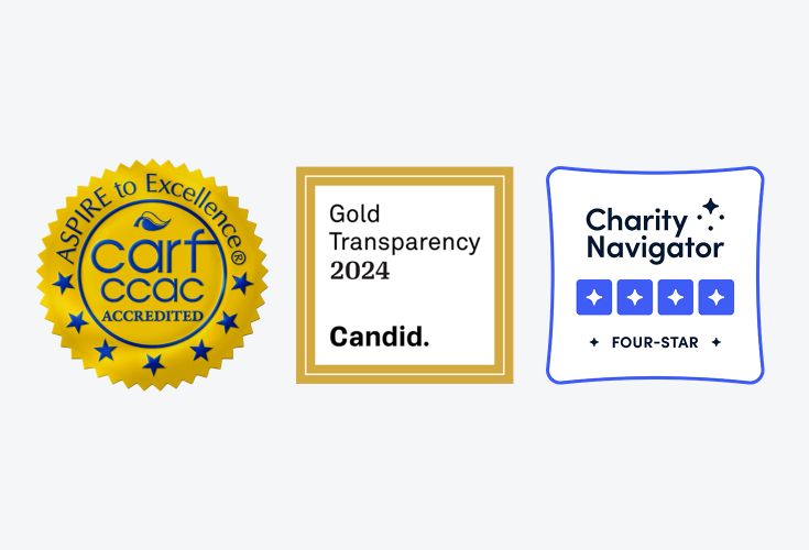 Three logos. The left one reads, "ASPIRE to Excellence. carf ccac accredited." The center one reads "Gold Transparency 2024. Candid." The right one reads, "Charity Navigator. Four-Star."