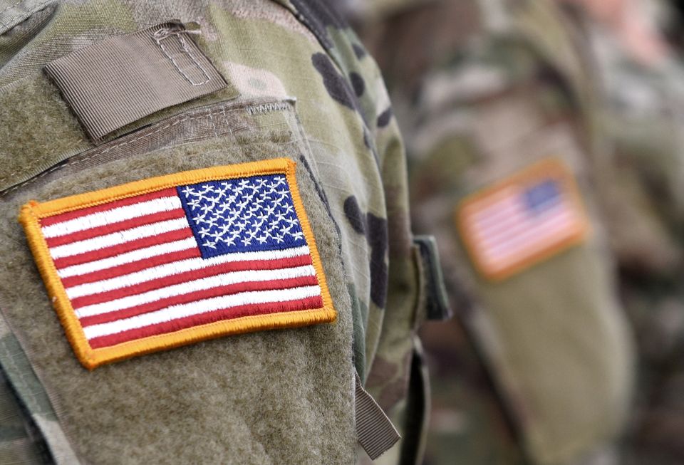 Close up of American flag patch on the shoulder of a soldier